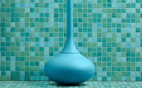 Ballo toilet brush front blue closeup green mosaic background 